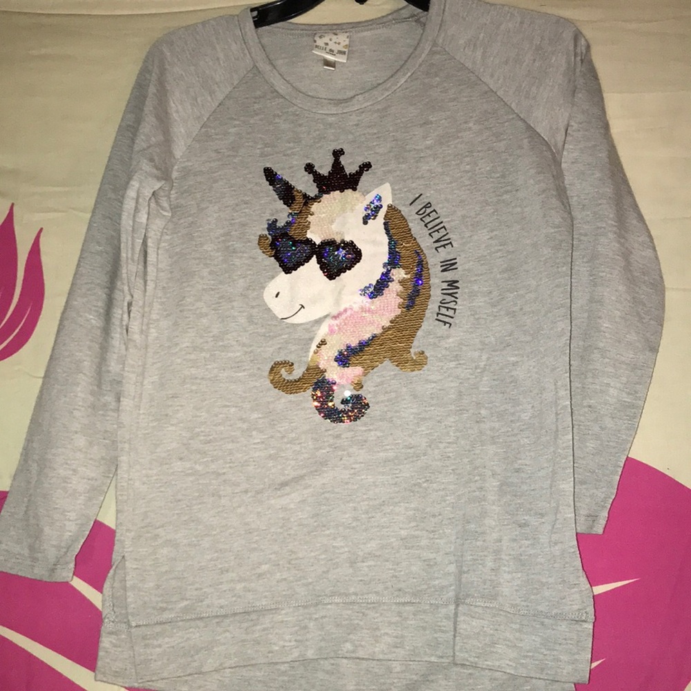 Light sweatshirt with color changing unicorn on front. 3/4 sleeved.